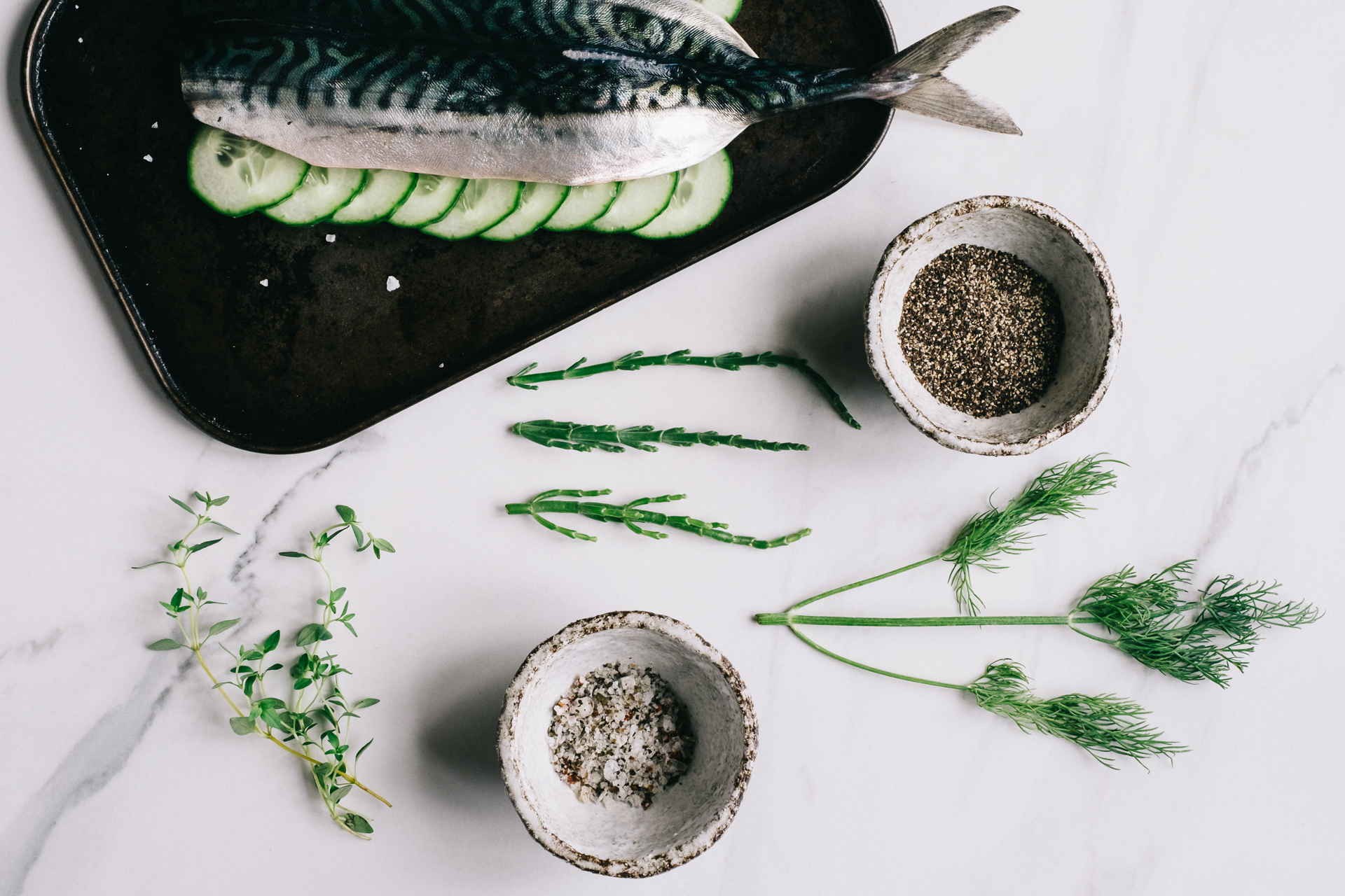 Green inspired image of mackerel and herbs for Lovingly Artisan