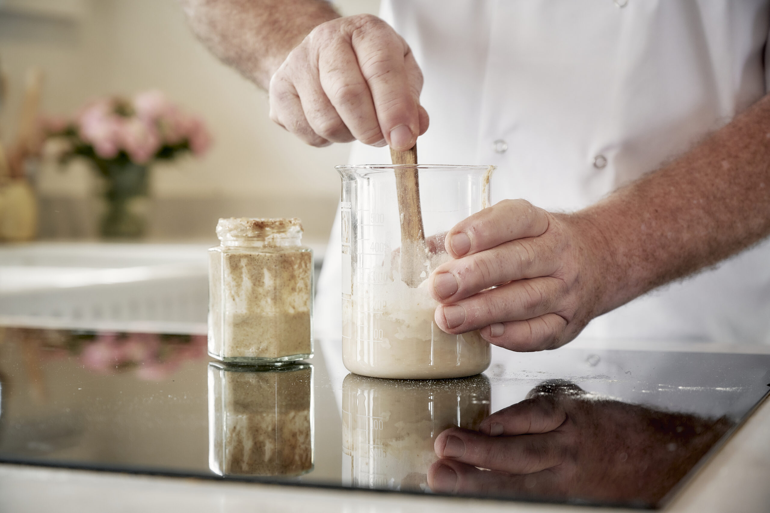 Sourdough Starter in jar with Aidan Monks Lovingly Artisan Kendal Sourdough Bakery Sourdough Artisan Bakery